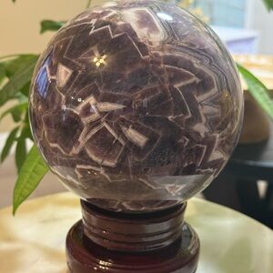 Amethyst Crystal Sphere on Wooden Stand
